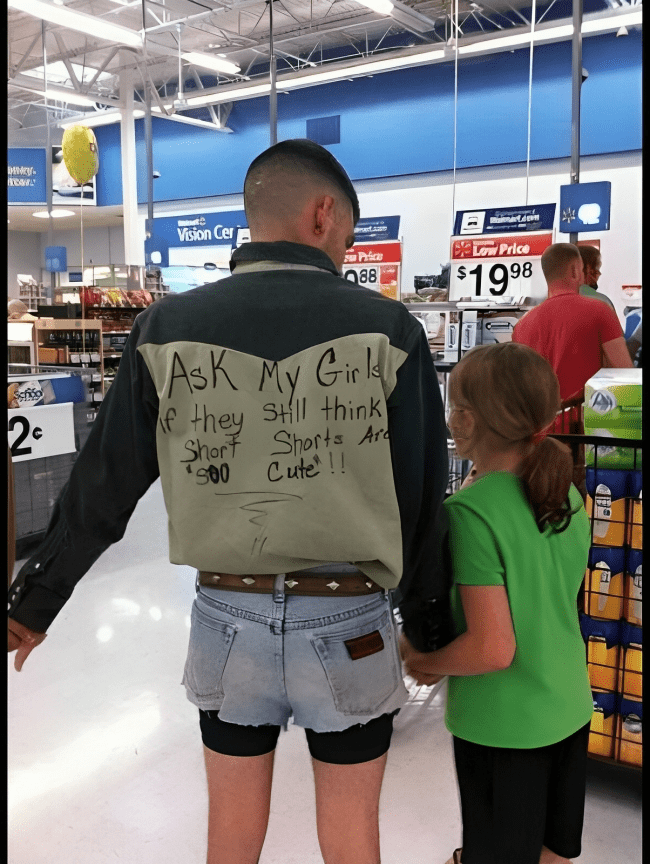 A person with a message on his back Description automatically generated